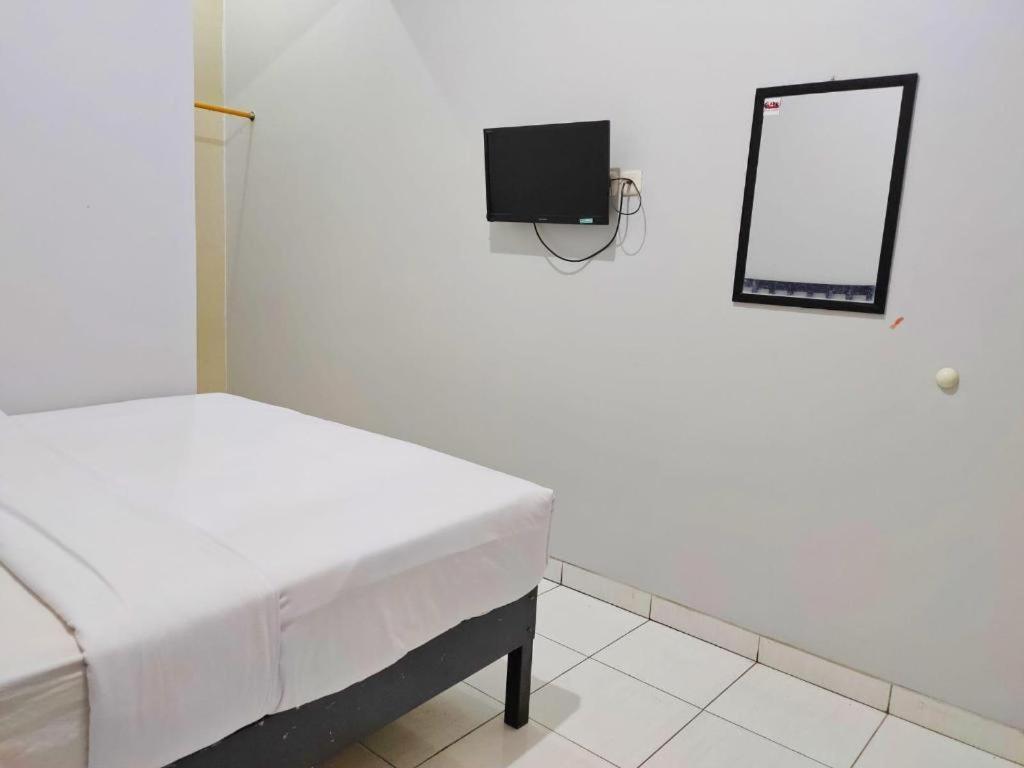 Hotel Syariah Tremigo Guesthouse Чиребон Экстерьер фото
